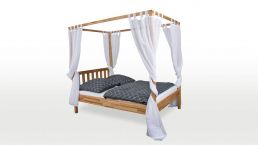 Canopy bed Karoline gets its individual character through individual curtains.